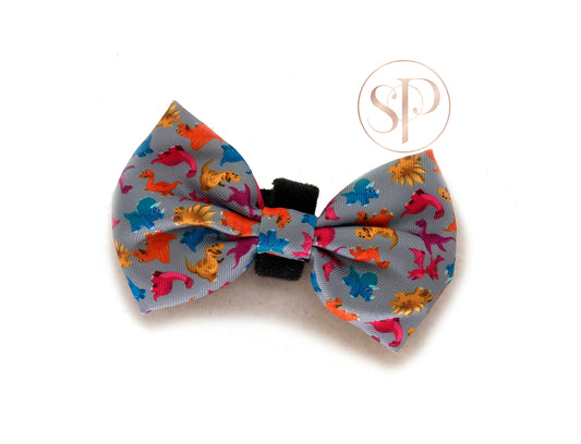 A super cute Roxi dinosaur bow from the Dogasaurs Collection. 