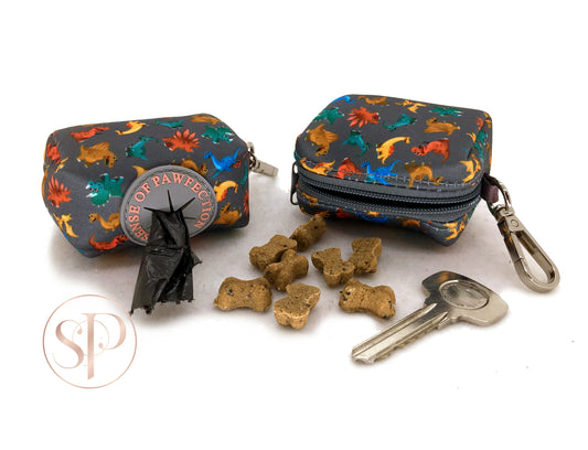 A cute little Rex Dinosaur doggy bag that can be used as a poop bag or treat holder from the Dogasaurs Collection.