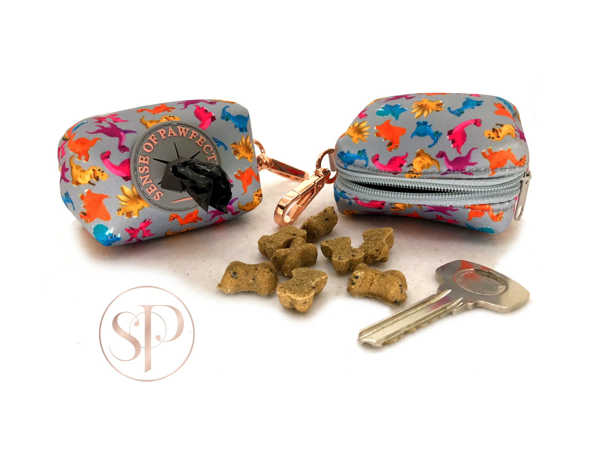 A cute little Roxi Dinosaur doggy bag that can be used as a poop bag or treat holder from the Dogasaurs Collection.