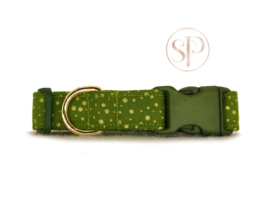 A gorgeously rich green dog collar with metallic gold spots.