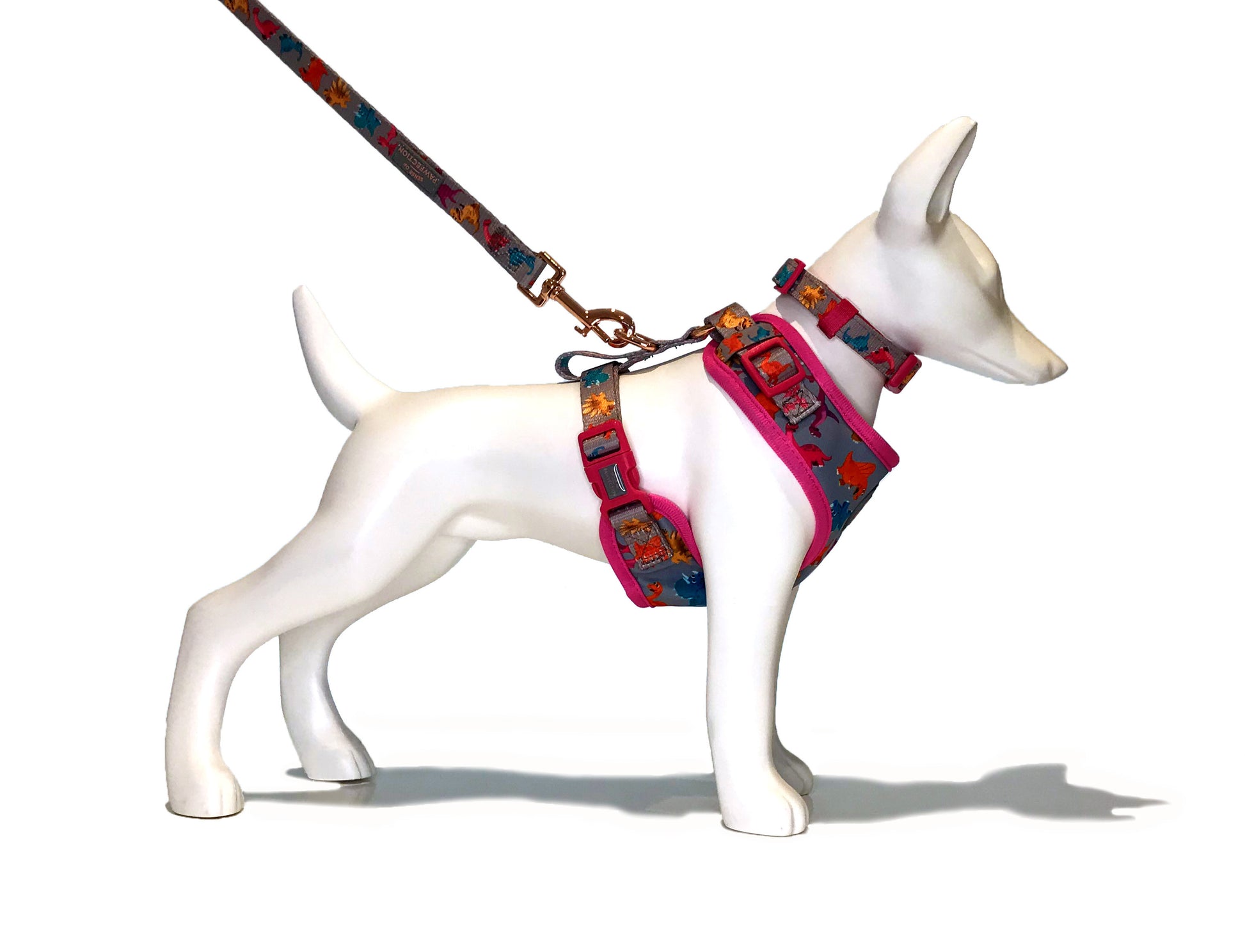 A cute and colourful dinosaur design ready-made adjustable dog harness from the Dogasaurs Collection.