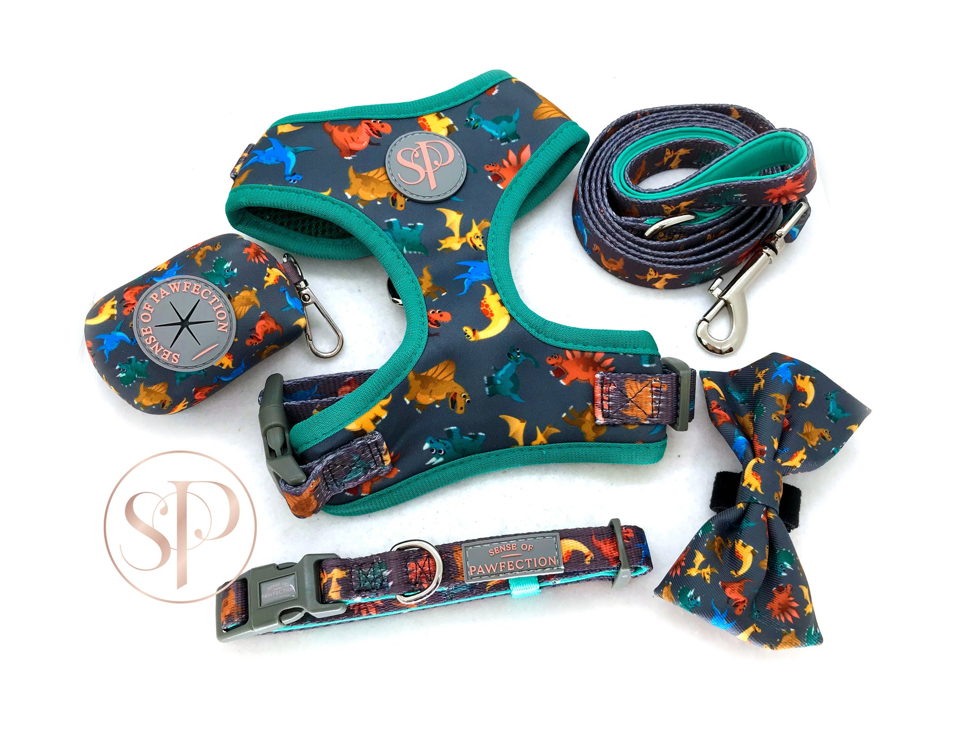 A super cute and colourful Dinosaur dog collar, lead, harness, bow tie and doggy bag holder from the Dogasaurs Collection.